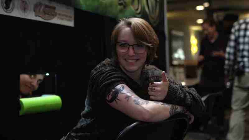 Richmond Tattoo & Arts Festival's Glory Hole Tattoos! From the brain of Jesse Smith, these free tattoos are the ultimate souvenir of the weekend. What you get is a surprise to you until the tattoo artist puts their machine down and you pull your arm out of the 'Glory Hole'. Surprise!, tags: convention - youtube